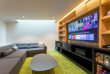 Yard apartments penthouse media room